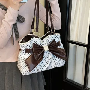 Vintage polka dot tote bag with large brown bow and lace trim for women fashion