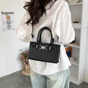 Fashionable black crocodile pattern tote bag with silver metal buckle and shoulder strap