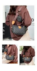 Detail of printed monogram crossbody bag with detachable round coin purse and gold chain