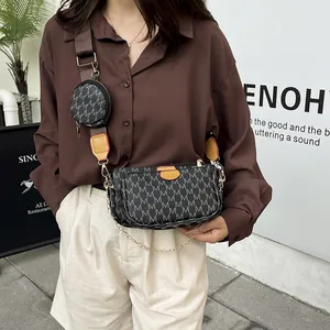 Three-in-one monogram crossbody bag with adjustable wide strap and metal chain detail
