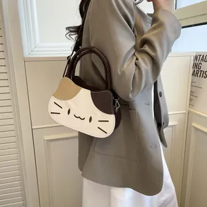 Cute cat-shaped crossbody bag in tricolor patchwork leather with a top handle for women
