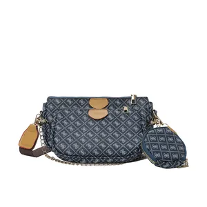 Three-in-one dark blue printed crossbody bag with gold chain and small round pouch