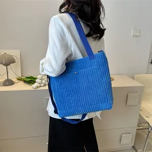 Borsa a tracolla in velluto a coste blu per donna con tasca frontale minimalista