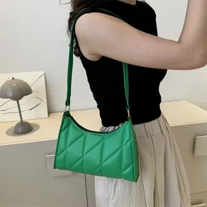 Chic lime green quilted leather crescent underarm handbag for women with zip closure