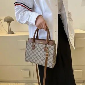 Fashionable brown PU leather crossbody bag with vintage geometric pattern and double handles