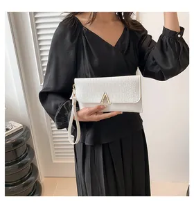 Chic white crocodile pattern envelope clutch bag with gold V-shaped metal lock detail