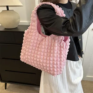 Pink popcorn texture shoulder tote bag for women showing a spacious casual daily design