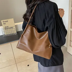 Minimalist brown PU leather shoulder bag with knot detail for women's daily commute