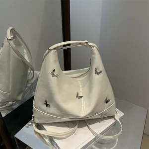Women Fashion PU Leather Shoulder Bag Large Capacity Tote Bag With Butterfly Metal Decor Summer Y2K Minimalist Underarm Bag