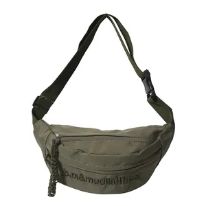 Minimalist army green crossbody chest bag with durable nylon strap and logo embroidery