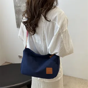 Sac bandoulière minimaliste en toile bleu marine, style vintage et grande capacité
