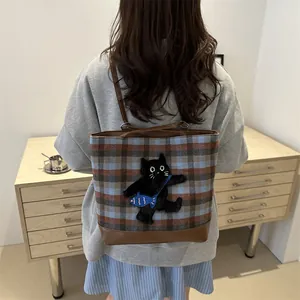 Plaid canvas tote bag with cute embroidered cat patch and brown leather shoulder straps