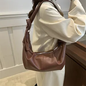 Brown lychee pattern faux leather hobo bag with a stylish knotted strap design