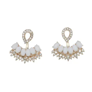Elegant gold drop earrings with oval white pearls and sparkling rhinestone accents