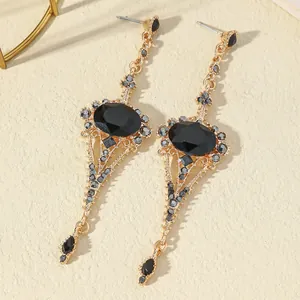 Bohemian fan-shaped tassel earrings with black gemstones and vintage gold finish
