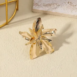 Elegant gold flower ring with layered petals and polished metallic finish for women
