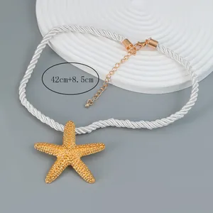 Detail of gold starfish pendant with 42+8.5cm braided white rope necklace cord