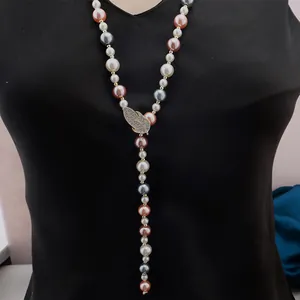 Long Y-shaped pearl necklace with multicolored beads and a diamond-set leaf pendant