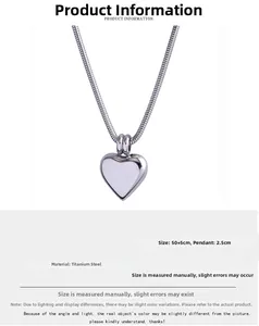 Detail of titanium steel heart pendant necklace featuring a 50cm snake chain design