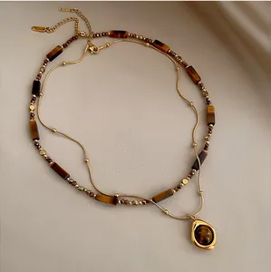 Collier Vintage en Acier Titane avec Pendentif Oeil de Tigre pour Femme Rétro Collier à Double Rangée de Perles Bijoux de Mode Style Maillard