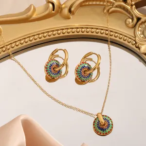 Set gioielli vintage in acciaio al titanio dorato con collana e orecchini a fiore smaltato
