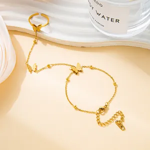 Golden butterfly finger bracelet set with frosted matte finish and beaded chain