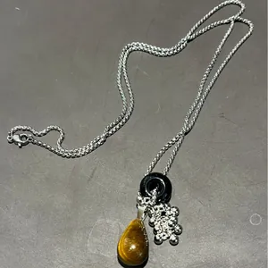 Tiger eye teardrop pendant necklace with black ring and silver chain for women