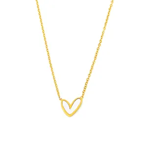 Minimalist gold heart necklace with white mother-of-pearl inlay on a refined link chain