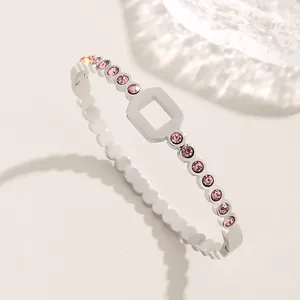 Silver titanium steel honeycomb ring with pink diamond crystals shown in profile view