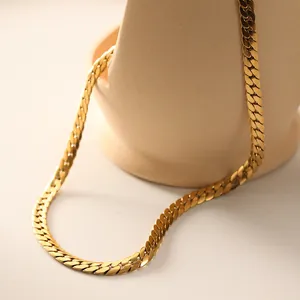 Minimalist gold plated stainless steel curb chain necklace with a polished metallic finish