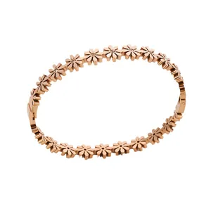 Rose gold daisy chain bracelet in stainless steel with sparkling crystal flower accents
