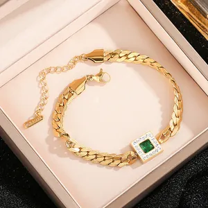 Gold plated stainless steel Cuban chain bracelet with emerald green stone and zircons