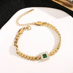 Gold plated stainless steel bracelet featuring square emerald and cubic zirconia