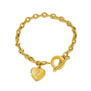 Gouden grove schakelarmband met hartbedel letter Z en NICE OT-toggle sluiting