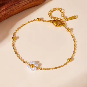 Elegant gold stainless steel flower pearl bracelet with delicate lobster clasp and link chain