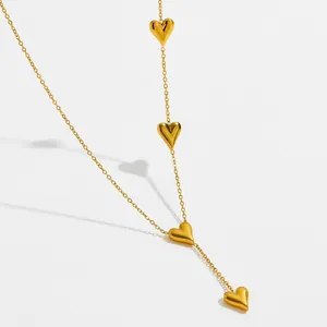 Gold titanium steel necklace featuring four minimalist 3D heart pendants on a fine chain