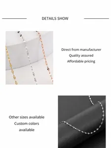 Detailed macro view of delicate gold and silver stainless steel lip chain necklaces