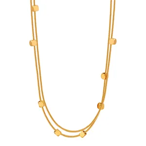 Collier double couche doré à maille serpent avec de petites perles cubes polies