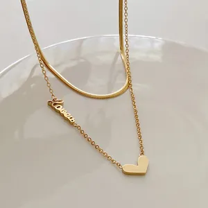 Zweilagige Goldkette aus Titanstahl mit Love-Schriftzug und massivem Herzanhänger
