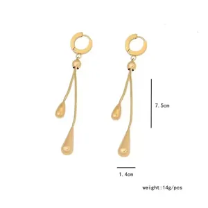 Polished gold drop earrings with adjustable snake chain tassels, 7.5cm length detail