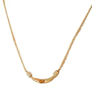 Vintage gold-plated titanium steel necklace featuring a curved hollow tiger eye pendant
