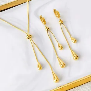 Elegant gold teardrop jewelry set with adjustable snake chain necklace and drop earrings