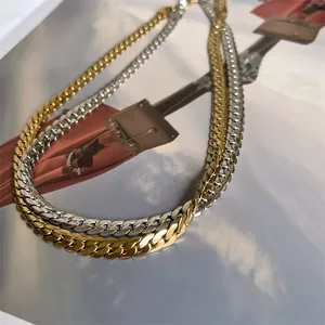 Polished gold and silver stainless steel Cuban link necklaces for women in layered style