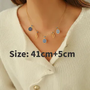 Detail of gold evil eye necklace with 41cm plus 5cm extender size measurement