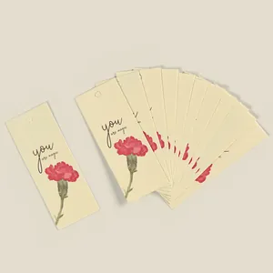 Floral carnation gift tags with you are magic text and hanging holes for packaging