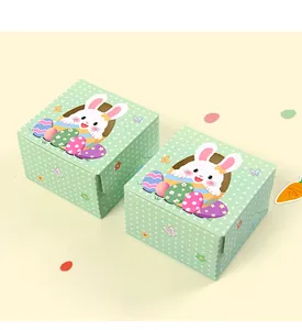 Detail view of the green polka dot Easter gift boxes showing fold-lock structure