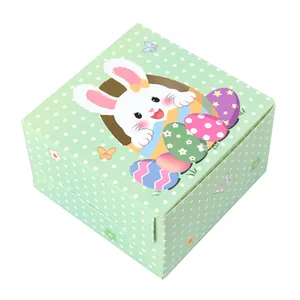 Green polka dot Easter gift box featuring a cute white rabbit and floral eggs design