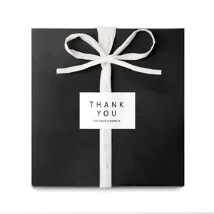 Square matte black gift box with white ribbon and Thank You For Your Kindness tag sticker