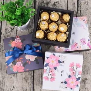 Detailweergave van de lade-cadeauverpakking met Merci Beaucoup tekst en 9-delige tray