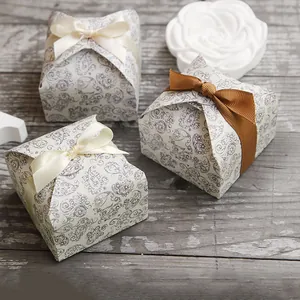 Square mini paper gift box with paisley pattern and ribbon for candles or soap